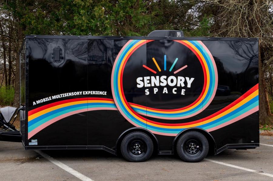 Black mobile trailer labeled Sensory Space